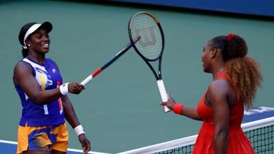 Serena Williams taps racquets with Sloane Stephens after their US Open third round match. EPA