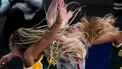 Baylor's DiJonai Carrington shoots past UConn's Paige Bueckers during the second half of their Elite Eight match-up at the Alamodome in San Antonio. AP