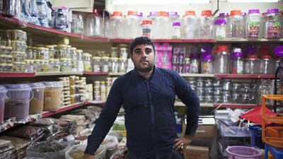 Mohammed Ahmed sells herbal medicine along with his friend Ikram Dawood at the Iranian market in Abu Dhabi. Anna Nielsen for The National