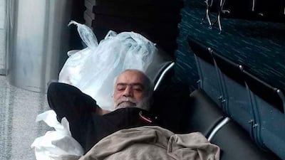 This photo provided by Diario El Universo on June 11, 2018 shows Lebanese citizen Nizam Hussein Shalak resting on a bench inside the terminal at the Jose Joaquin de Olmedo Airport in Guayaquil, Ecuador. Diario El Universo via AP