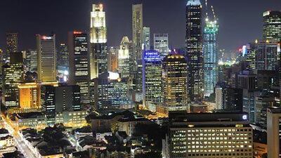 Singapore's skyline: the city state is a popular residence for mobile millionaires. Munshi Ahmed / Bloomberg News