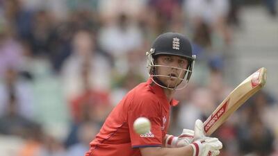 England's Jonathan Trott hits out during the ICC Champions Trophy semi final match against South Africa at The Oval cricket ground, London June 19, 2013. REUTERS/Philip Brown