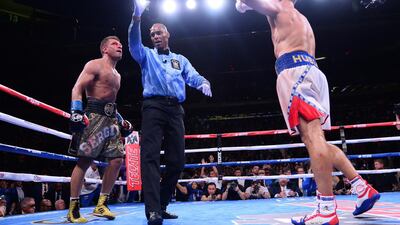 Gennadiy Golovkin and Sergiy Derevyanchenko react after the IBF World Middleweight Championship boxing match at Madison Square Garden. Reuters