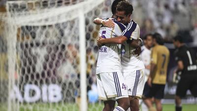 Alex Brosque is congratulated after scoring his second of the game. Lee Hoagland/The National