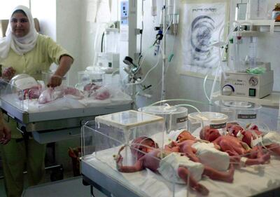 An Egyptian nurse monitors newborn the septuplets of a woman who gave birth to four males and three females at the hospital of the University of Alexandria, 220 km north of Cairo. AFP, August 2008