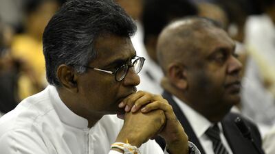 Champika Ranawaka, left, and Mangala Samaraweera, right, loyalist MPs for Ranil Wickremesinghe. AFP