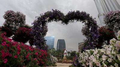 Visitors browse the gardens during the Dubai International Garden Competition, which brings together thirteen of the best local, regional and global landscapers. Satish Kumar / The National