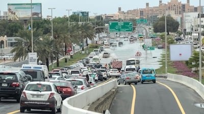 Rain in Dubai in January flooded the street connecting Sheikh Zayed Road to Madinat Jumeirah. Antonie Robertson / The National