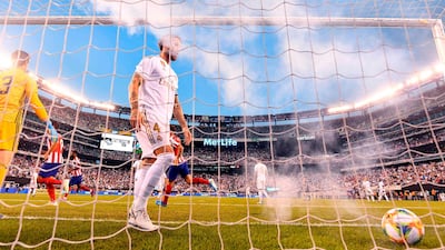 Real Madrid's Spanish defender Sergio Ramos reacts after one of Atletico's seven goals. AFP