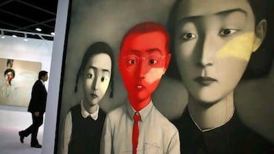 A painting by the Chinese artist Zhang Xiaogang, Bloodline-Big Family. One of his paintings, Forever Lasting Love, was sold for a record of more than HK$79 million at a Sotheby's auction in Hong Kong last week.