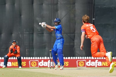 UAE's Adeeb Usmani cuts Netherlands seamer Bas de Leede. Photo: ICC/ECB