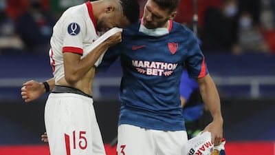 Youssef En-Nesyri, left, and Sergi Gomez of Sevilla after losing the final. EPA