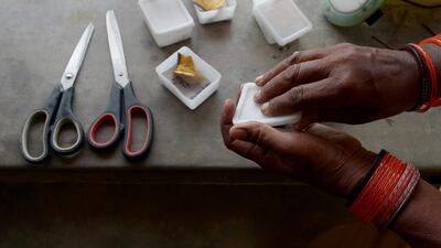 A female moth is put inside an egg laying box. The thriving industry in Bihar supplements the tribal communities’ traditional rice farming in a region which lacks irrigation and is at the mercy of poor monsoon rains.
