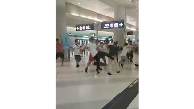 Protesters trying to return home were attacked inside a train station by assailants who appeared to target the pro-democracy demonstrators. Lam Cheuk-ting via AP