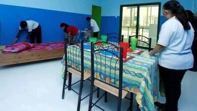 As well as office tasks, students will practise making simple salads and sandwiches, doing laundry, ironing clothes and setting the table. Jeffrey E Biteng / The National