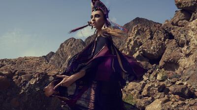 TRIBAL CALLING: Jacket, Dh34,450, Gucci. Dress, Dh14,500, Lanvin. Trousers, Dh4,928, Mary Katrantzou at Stylebop. Headpiece, stylist’s own. Earrings, Dh1,510, Halaby At S*uce.