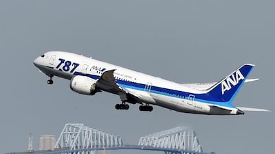 An ANA 787 Dreamliner taking off from Tokyo's Haneda airport. The carrier has suffered problems with the Rolls-Royce engines on its 787 fleet of 50 aircraft. Kazuhiro Nogi / AFP