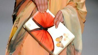 A model walks the runway at the Digital Clutch Design reveal by HP and Vivienne Tam. Arun Nevader / Getty Images for HP