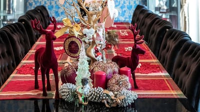 A memory tree and wedding tree sit on the dining table