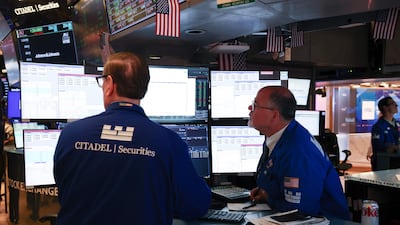 Traders work on the floor of the New York Stock Exchange. US government bond yields this month reached their highest levels since 2002. AFP