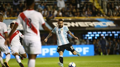 Lionel Messi has a shot at goal. Agustin Marcarian / Reuters