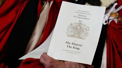 A member of the House of Lords holds a programme for the State Opening of Parliament. Getty Images