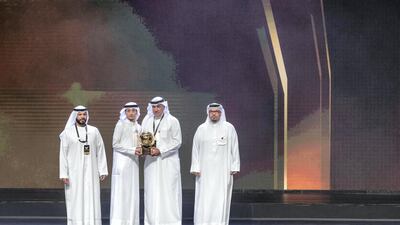 Omar Abdulrahman collects his award for best Emirati player. Antonie Robertson / The National