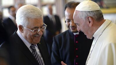 Pope Francis talks to Palestinian President Mahmoud Abbas during a private audience in the pontiff library at the Vatican. Maurizio Brambatti/Pool via Reuters
