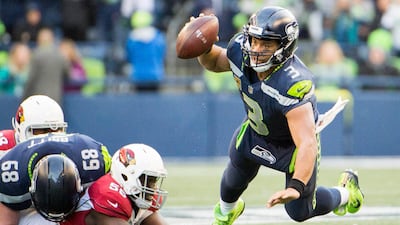 Russell Wilson, right, and the Seattle Seahawks will be playing in England in October. Troy Wayrynen / USA Today Sports