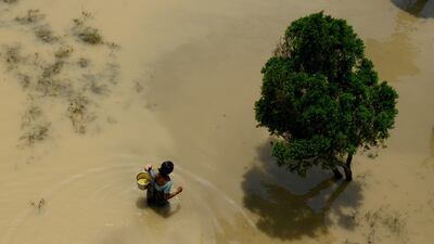 Monsoons has been above average this year, causing floods in some states such as Kolkata, pictured. But crop sowing has decelerated. Dibyangshu SARKAR/AFP