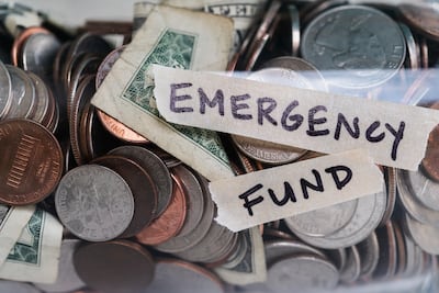 If you're in a position to, start building an emergency fund to cover at least a month of essential expenses. Getty Images
