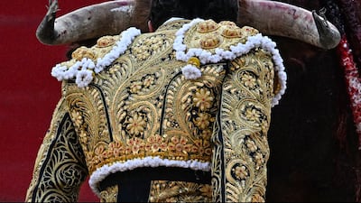 French matador Carlos Olsina faces the bull during a bullfight, part of the Feria in Beziers, south-western France. AFP