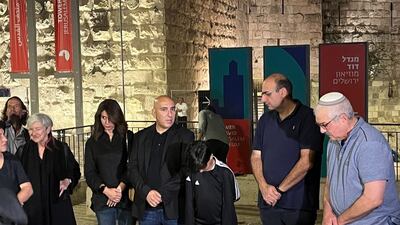 A small group of Muslims, Christians and Jews gather to honour the victims of the Israel-Gaza war. Thomas Helm / The National