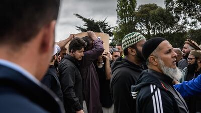 Mourners help to carry a casket containing the body of Haji Mohammed Daoud Nabi, 71, a victim of the Al Noor Mosque massacre. AFP