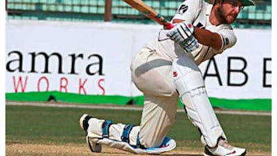 New Zealand's captain Daniel Vettori plays a shot as he guides his side to victory over Bangladesh.