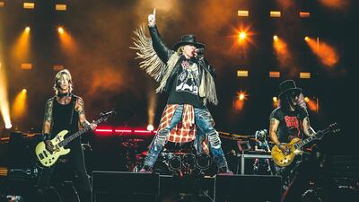 The classic Guns N' Roses line up of frontman Axl Rose, guitarist Slash and bassist Duff McKagan. Photo: 117Live