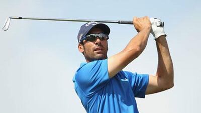 Alvaro Quiros had a hole-in-one, chipped in for an eagle and also lost a ball up a palm tree in a final-round 68 to win by a stroke at 11-under par.