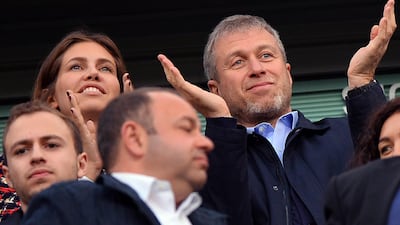 Chelsea's Russian owner Roman Abramovich (R) has split from his third wife Dasha Zhukova (L) after nine years of marriage. Credit: AFP PHOTO / Ben STANSALL