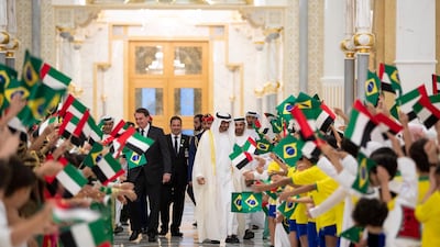 Sheikh Mohamed bin Zayed, Crown Prince of Abu Dhabi and Deputy Supreme Commander of the UAE Armed Forces, meets Jair Bolsonaro, President of Brazil, at the Presidential Palace in Abu Dhabi on Sunday. Courtesy Sheikh Mohamed bin Zayed Twitter