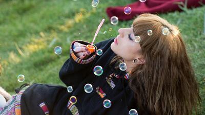 A girl takes part in the summer solstice dawn celebrations after Druids, pagans and revellers gathered for the Summer Solstice sunrise at Stonehenge. A sunny forecast brought thousands of revellers to the 5,000 year old stone circle in Wiltshire to see the sunrise on the Summer Solstice dawn. Tim Ireland / Getty Images