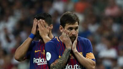 Lionel Messi and Luis Suarez's frustrated looks on Wednesday after Barcelona lost 2-0 to Real Madrid in the second leg of the Spanish Super Cup sum up a difficult summer for the Catalan side. Juan Medina / Reuters