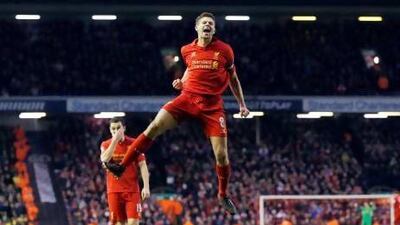 Liverpool's Steven Gerrard celebrates after his sides fourth goal, of five, against Norwich City. Phil Noble / Reuters