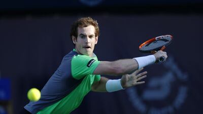 Andy Murray returns a shot to Gilles Muller during his first round win on Tuesday at the Dubai Duty Free Tennis Championships. Ahmed Jadallah / Reuters