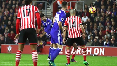 Diego Costa of Chelsea, centre, scores his side’s second goal. Clive Rose / Getty Images
