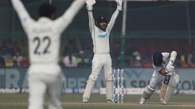 New Zealand wicketkeeper Tom Blundell appeals successfully for the wicket of India's Ajinkya Rahane - lbw off the bowling of Ajaz Patel - for four. AP
