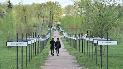 A couple of tourists at the Chernobyl exclusion zone. The site has seen a surge in visitor numbers. Sergei Supinsky/AFP