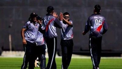 Khurram Khan, centre, believes the UAE have made progress at the top level since his international debut in 2001. Christopher Pike / The National