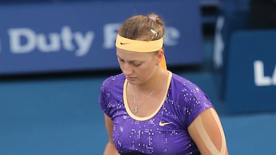 Petra Kvitova reacts during her match against Daniela Hantuchova, Ali Haider/EPA
