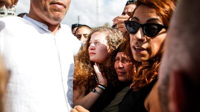Ahed Tamimi was surrounded by supporters upon her release. AFP