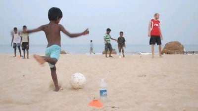 Children participate in a soccer event in Chennai sponsored by Slum Soccer. The game is an effective way to teach its players life, leadership and communication skills.